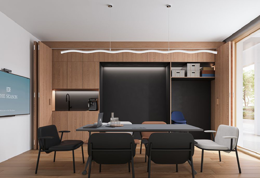 Salle polyvalente Flexspace avec table de réunion et écran